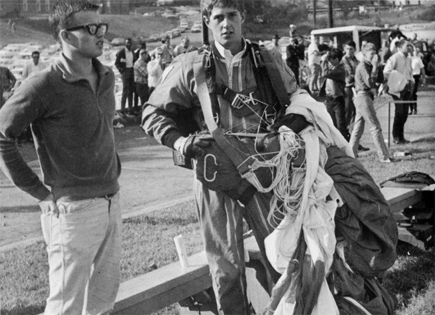 Richard Wallrather gives an exciting exhibition of sky-diving during half-time at the 1967 homecoming game.