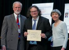Professor Phil Todd receiving award.