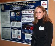 Dr. Raniyah Ramadan, who died last July, is shown with a poster explaining her research