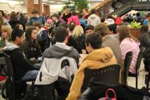 Students gathered in chairs for interscholastic meet