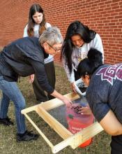 Dr. Holly Jones teaches East Central University students archeological flotation techniques in this pre-Covid file photo.