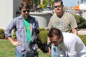 students using telescope