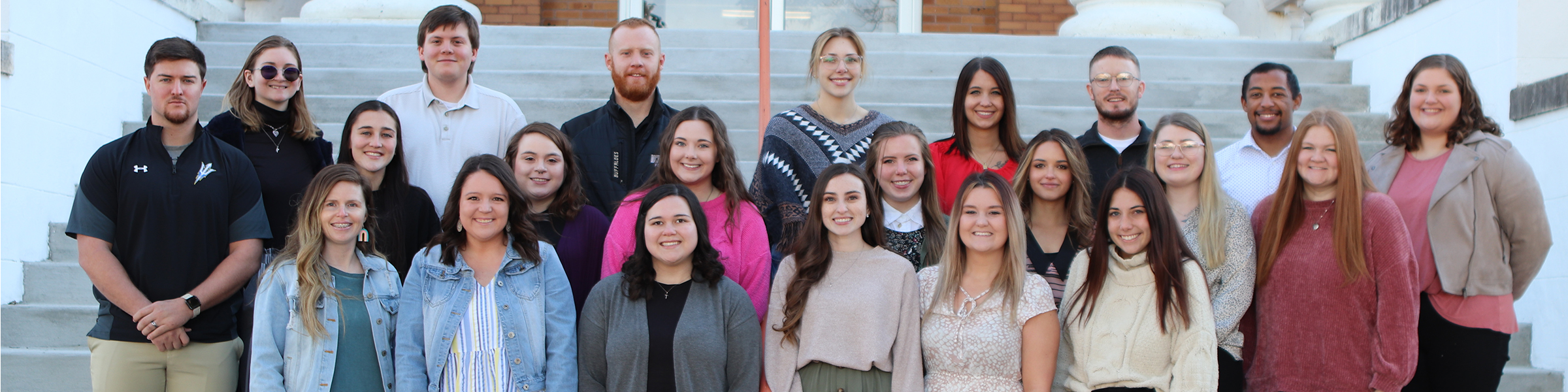 Spring 2022 Student Teachers standing on the step of Science Hall