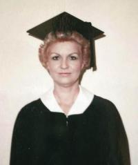 Connie Lancaster wearing cap and gown