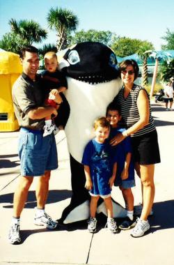 The young Godwin family travels to Sea World for vacation