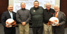 Chickasaw Nation Gov. Bill Anoatubby (left) poses with (moving right) former East Central University head football coach Hank Walbrick, current ECU head football coach Tim McCarty, former ECU head football coach Pat O’Neal and ECU President John R. Hargrave at the ECU Tiger 2014 Dinner and Live Auction on Tuesday in the ECU Foundation Hall of the Chickasaw Business and Conference Center. It was announced at the event that ECU’s football stadium will be named Koi Ishto Stadium. Koi Ishto means ‘Big Cat’ in t