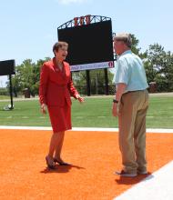 President Pierson, Crabtree view new scoreboard.