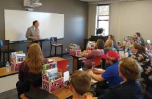 Ada City Schools Superintendent Mike Anderson addresses ECU student teachers.