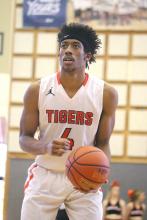 ECU senior Jalan Brown sets up for a free throw during a basketball game in February.