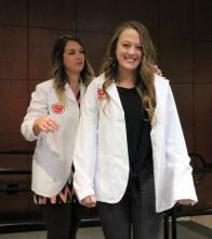 ECU Nursing students participate in white coat ceremony.