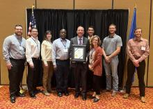 Oka’ Institute Director Duane Smith received the 2023 Oklahoma Water Pioneer Award. Pictured alongside ECU president Wendell Godwin and other members and supporters of the Oka’ Institute.
