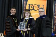 East Central University graduate Bethany Bengs receives the George Nigh Award at the ECU Spring 2023 commencement ceremonies on May 6. Pictured from left are ECU President Wendell Godwin, Bethany Bengs, and Provost and Vice President of Academic Affairs Jeffrey Gibson. 