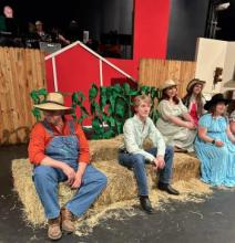 Photo cutline: “Kickin’ Up Country” cast is shown preparing for the show 7:30 p.m. Thursday-Friday (April 20-22) at the East Central University Hallie Brown Ford Fine Arts Center. 