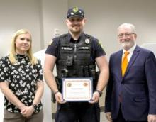 Officer Vernon Langley is pictured with Melissa Inglis (left), assistant dean of the East Central University College of Liberal Arts and Social Sciences, and Thomas Parr, director of the ECU Collegiate Officer Program.