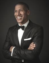 Photo of Shannon LaNier wearing black tux and bowtie