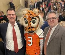 Gov. Kevin Stitt poses for the camera with Roary and Interim ECU President Dr. Jeffrey Gibson at the State Capitol for Higher Education Day Feb. 15, 2022.