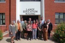 ECU students and administrators pose with Teach to Reach Grant Coordinator Stacy Hallmark. Pictured from left are: student Kristie Rodgers, Dr. Jerry Mihelic, ECU President Wendell Godwin, Dr. Shelli Sharber, Stacy Hallmark, Dr. Jeffrey Gibson, students Makenzie Hernandez, Lexus Morgan, Bailey Giles, Deyton Ashby, Hali Bray, and Victoria Barbour.